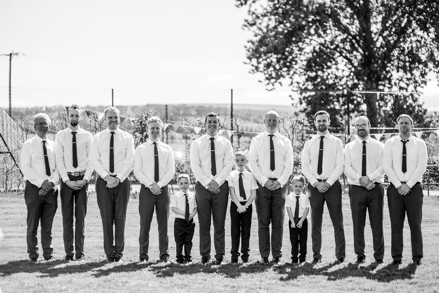 portrait of groom and groomsmen