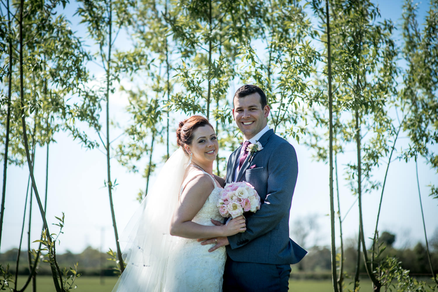 bride and groom looking very happy