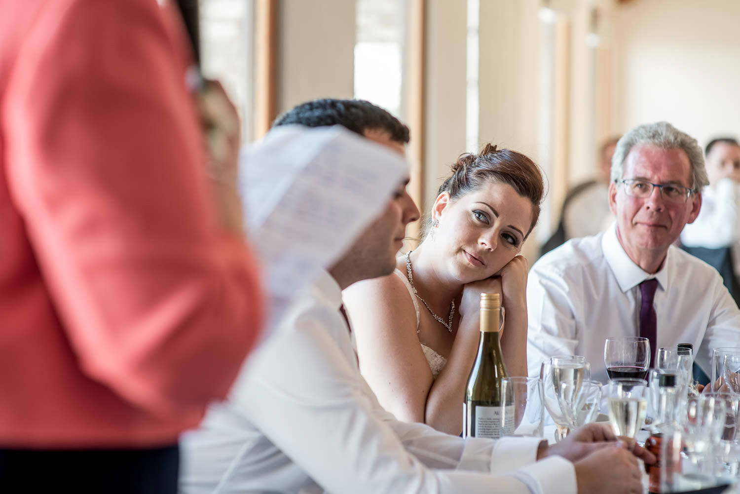 beautiful bride listening to the speeches