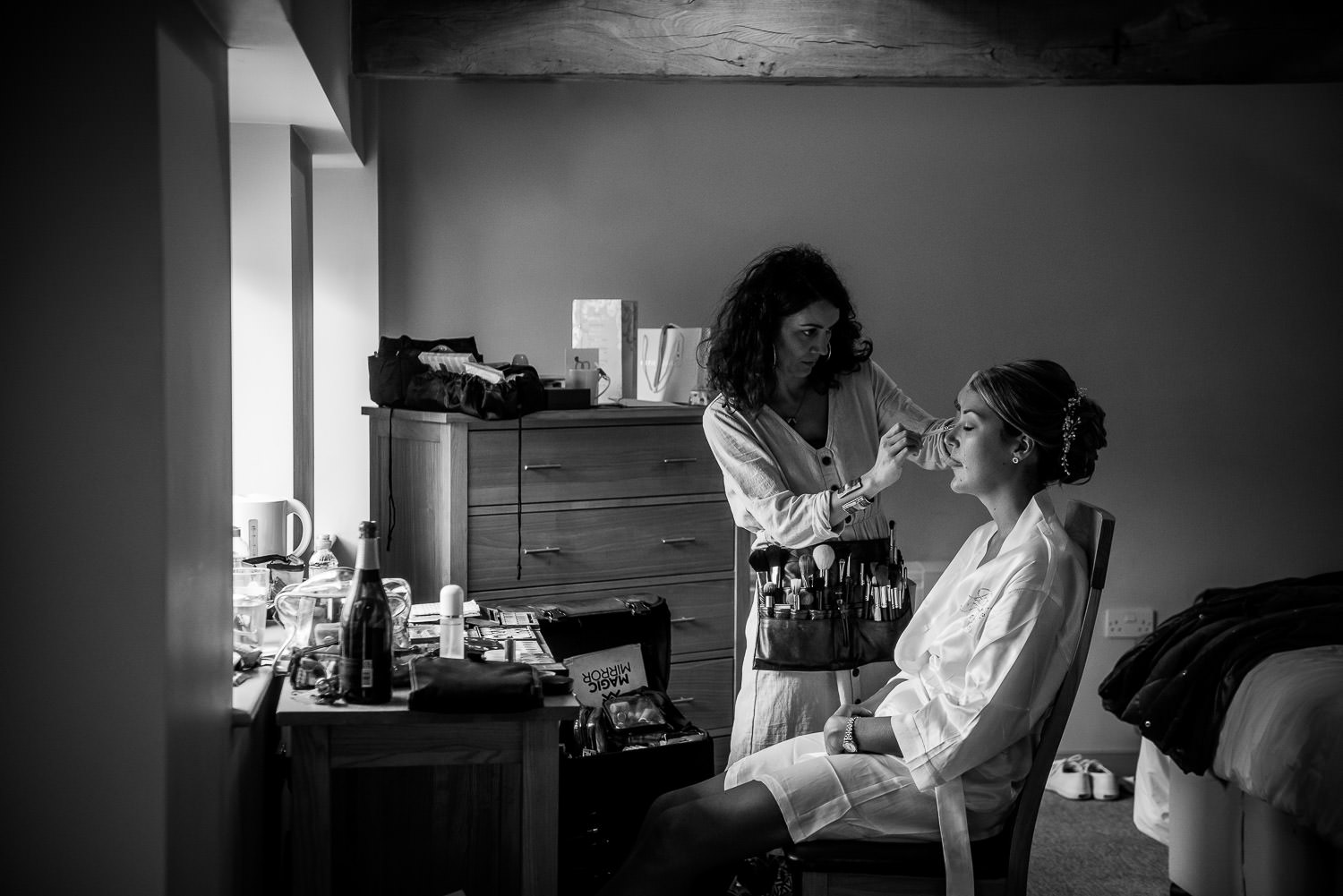 bride having her makeup done folly farm