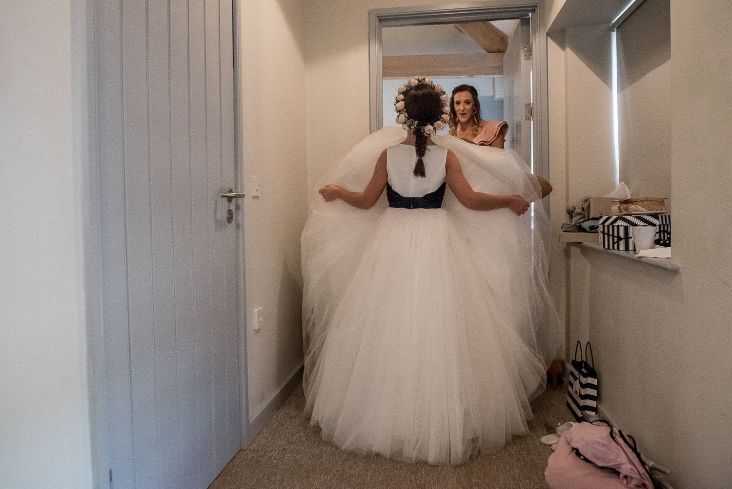 flower girl lifting up her dress