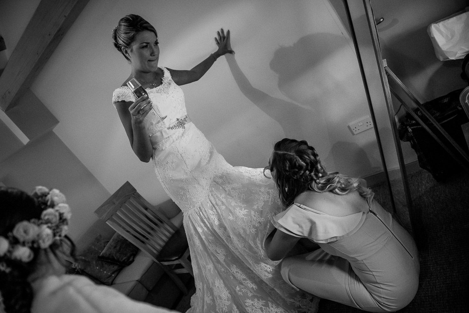 bride putting on her shoes