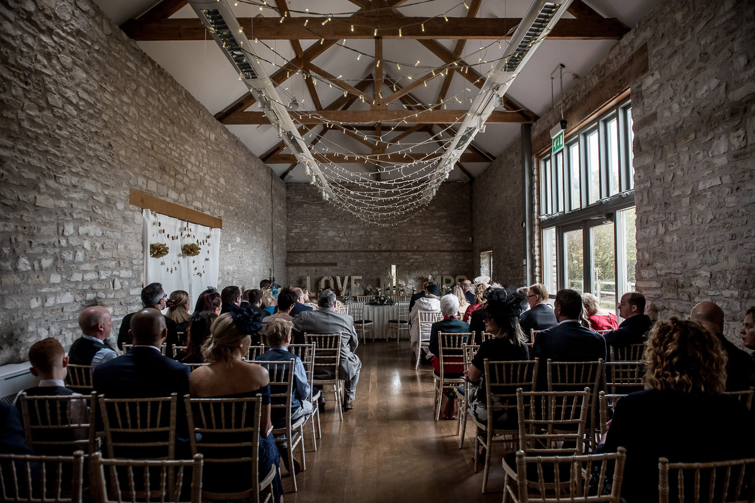 wedding guests waiting for the wedding ceremony at folly farm