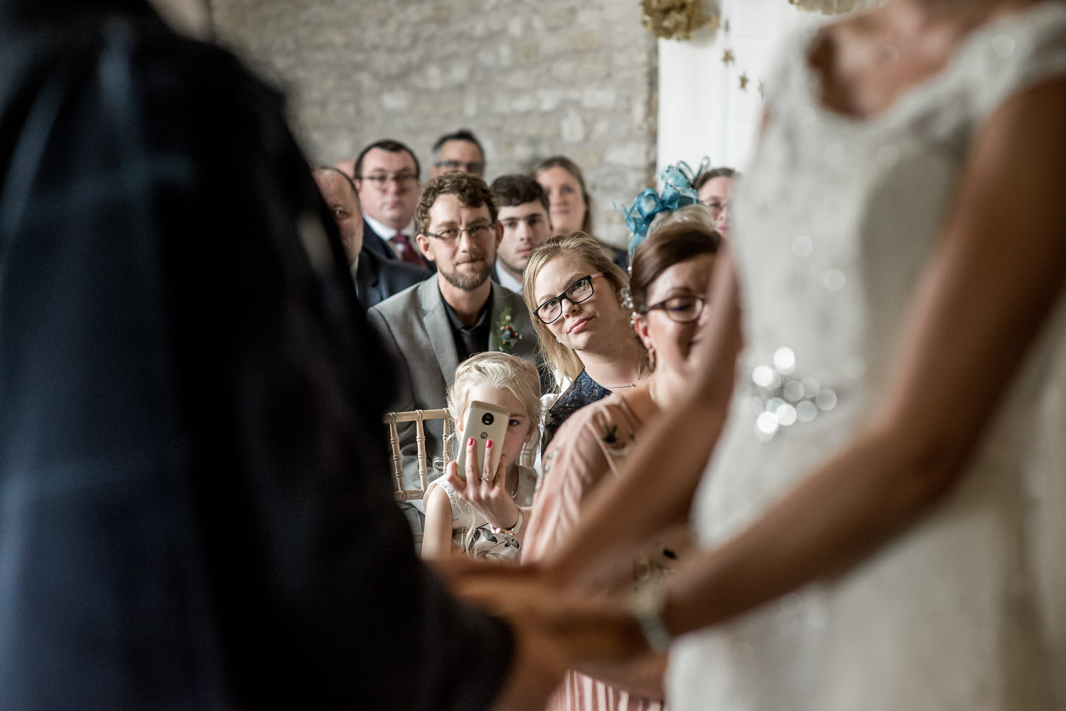 wedding guests looking at the ceremony