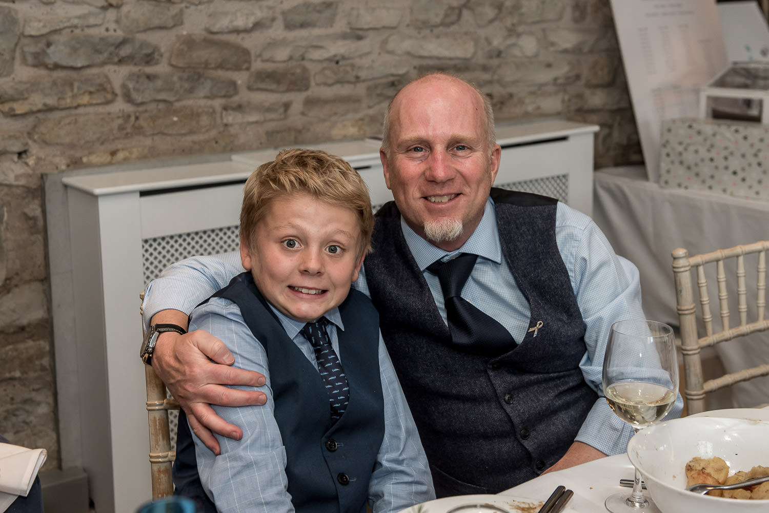 wedding guest with his son