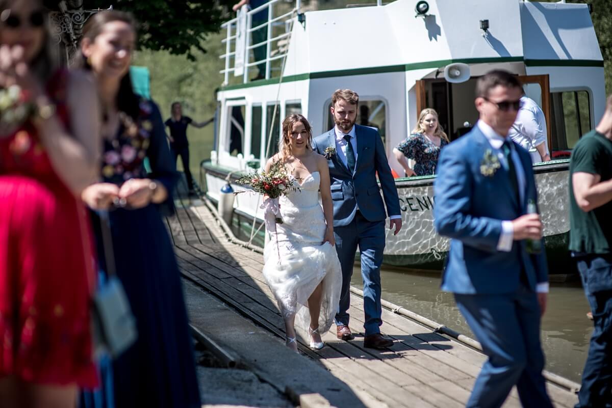 bride and groom getting off pulteney cruiser, bath wedding photography
