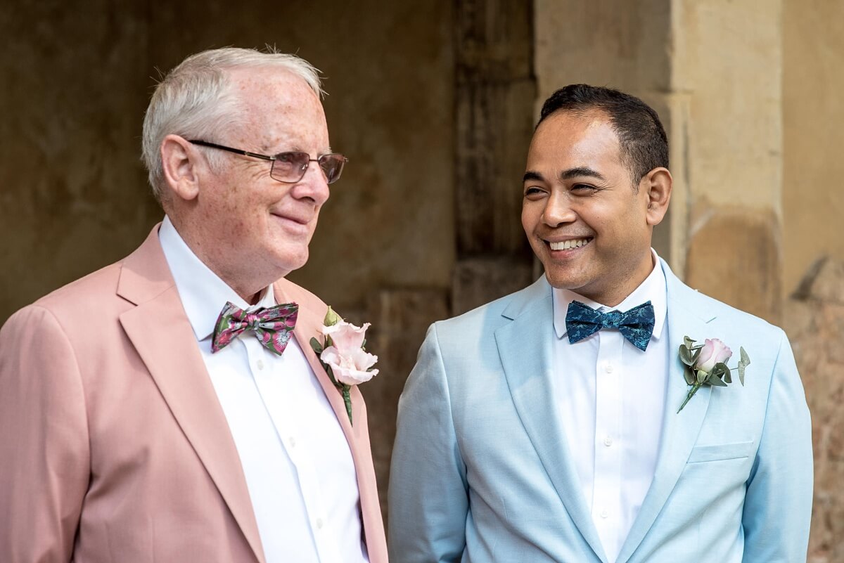 groom and groom at the roman baths wedding in bath