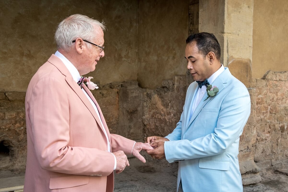 groom and groom at the roman baths wedding in bath