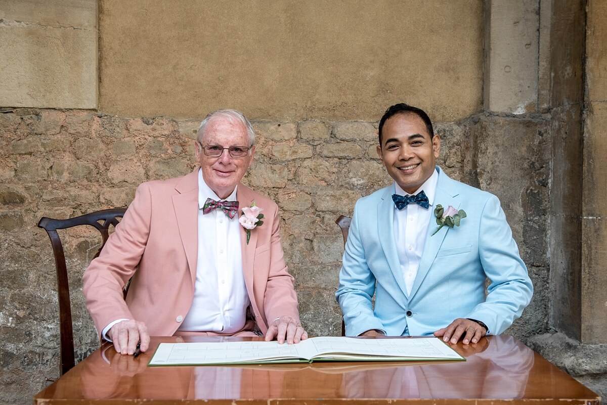 groom and groom at the roman baths wedding in bath