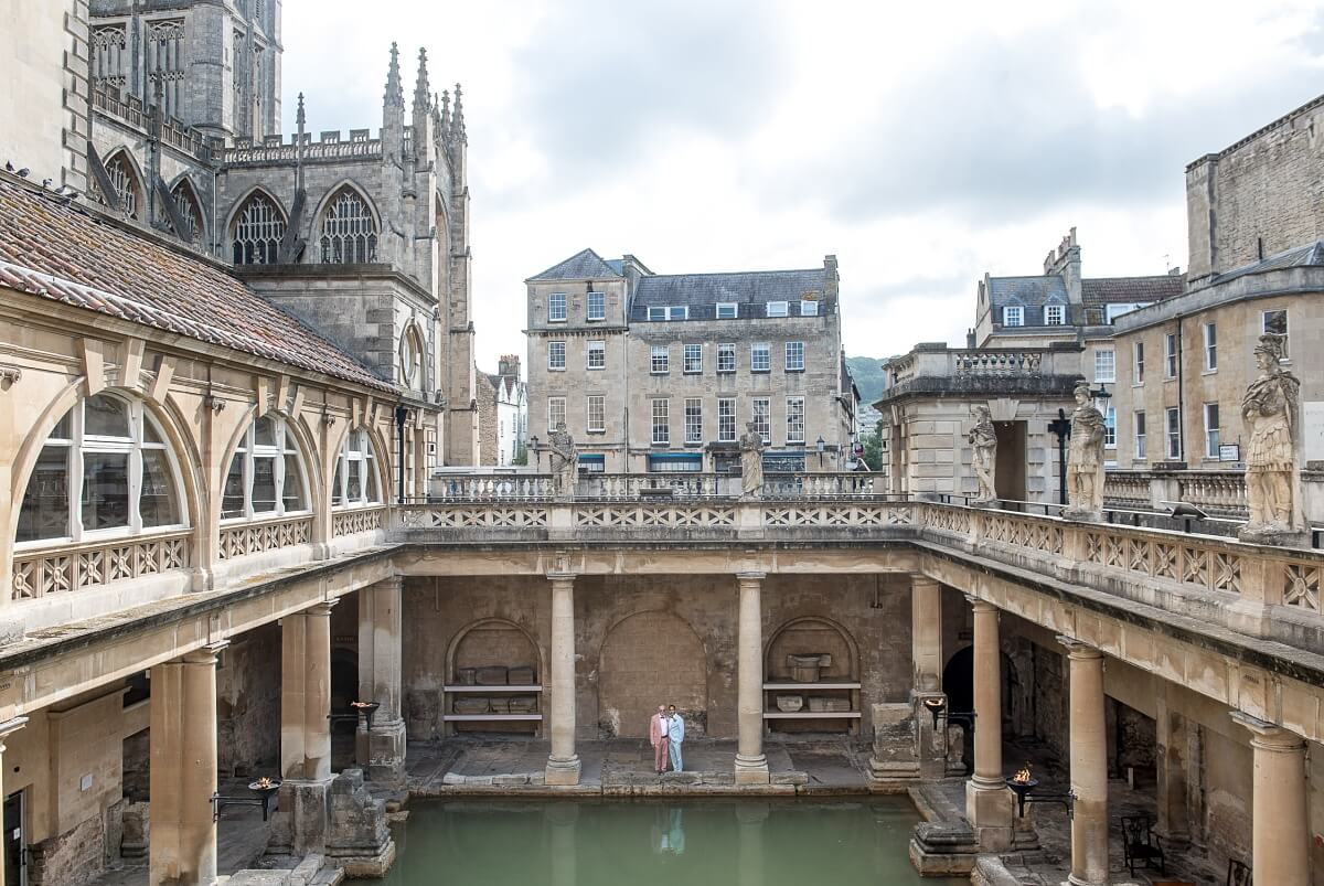 groom and groom at the roman baths wedding in bath