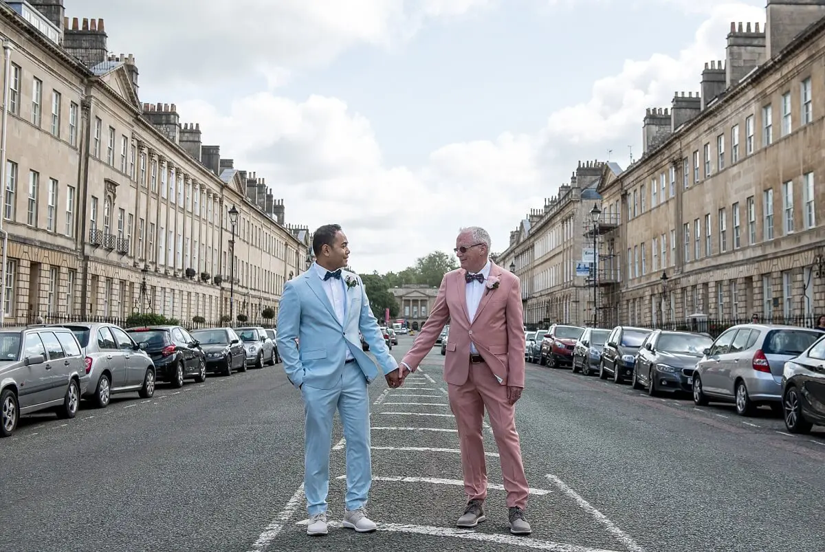 Male wedding couple in front of Great Pulteney Street Bath Wedding Photographer