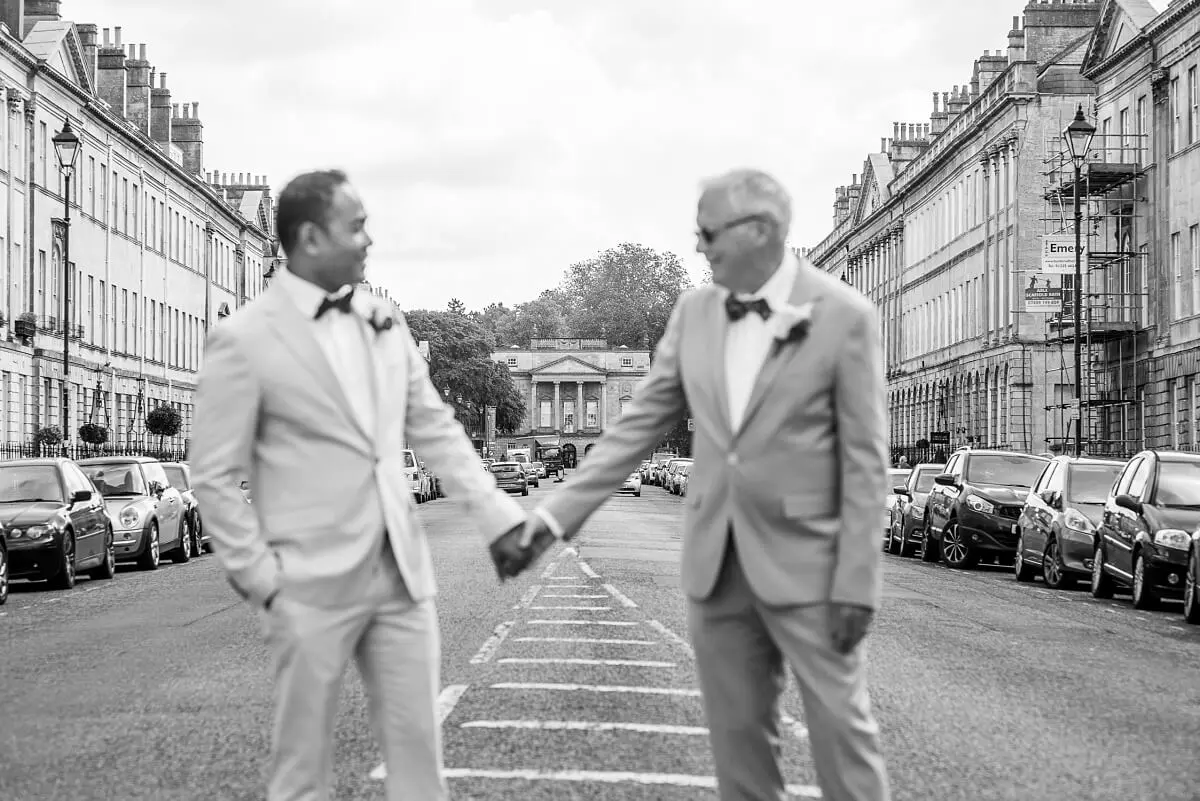 Male wedding couple in front of Great Pulteney Street Bath Wedding Photographer