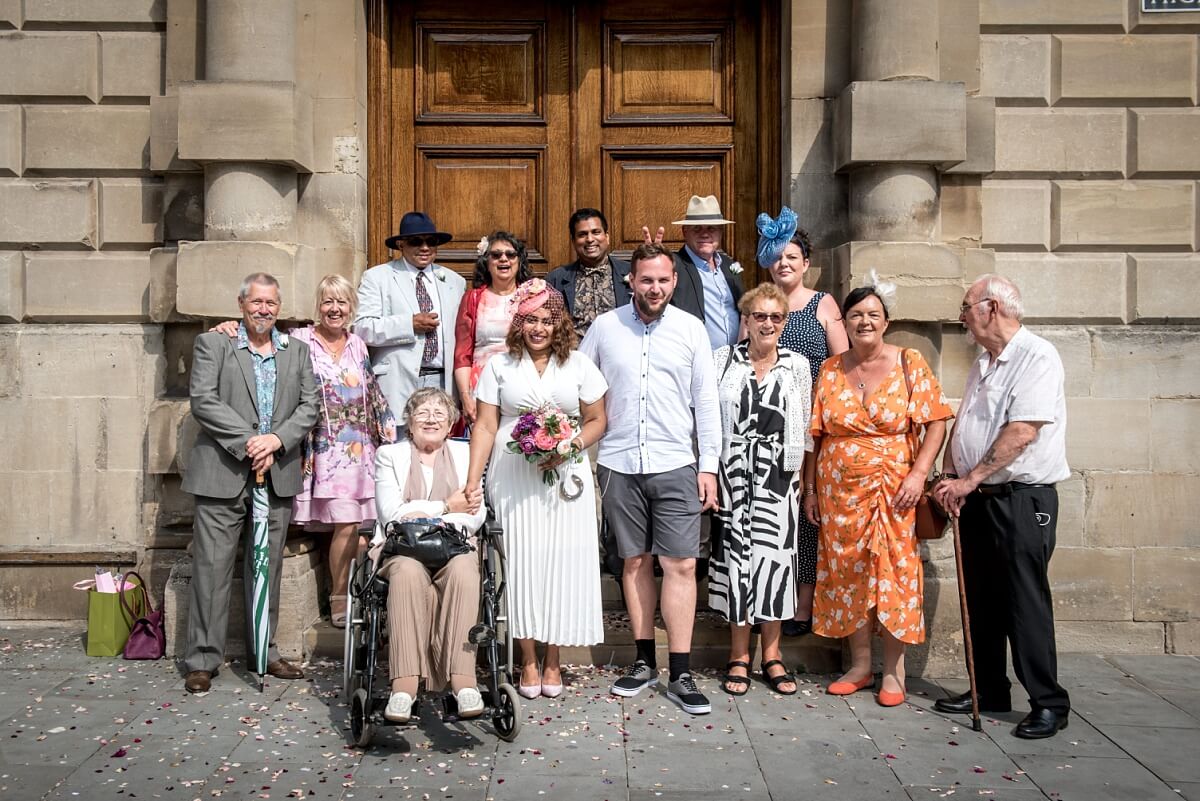 wedding group picture outside the Guildhall in Bath